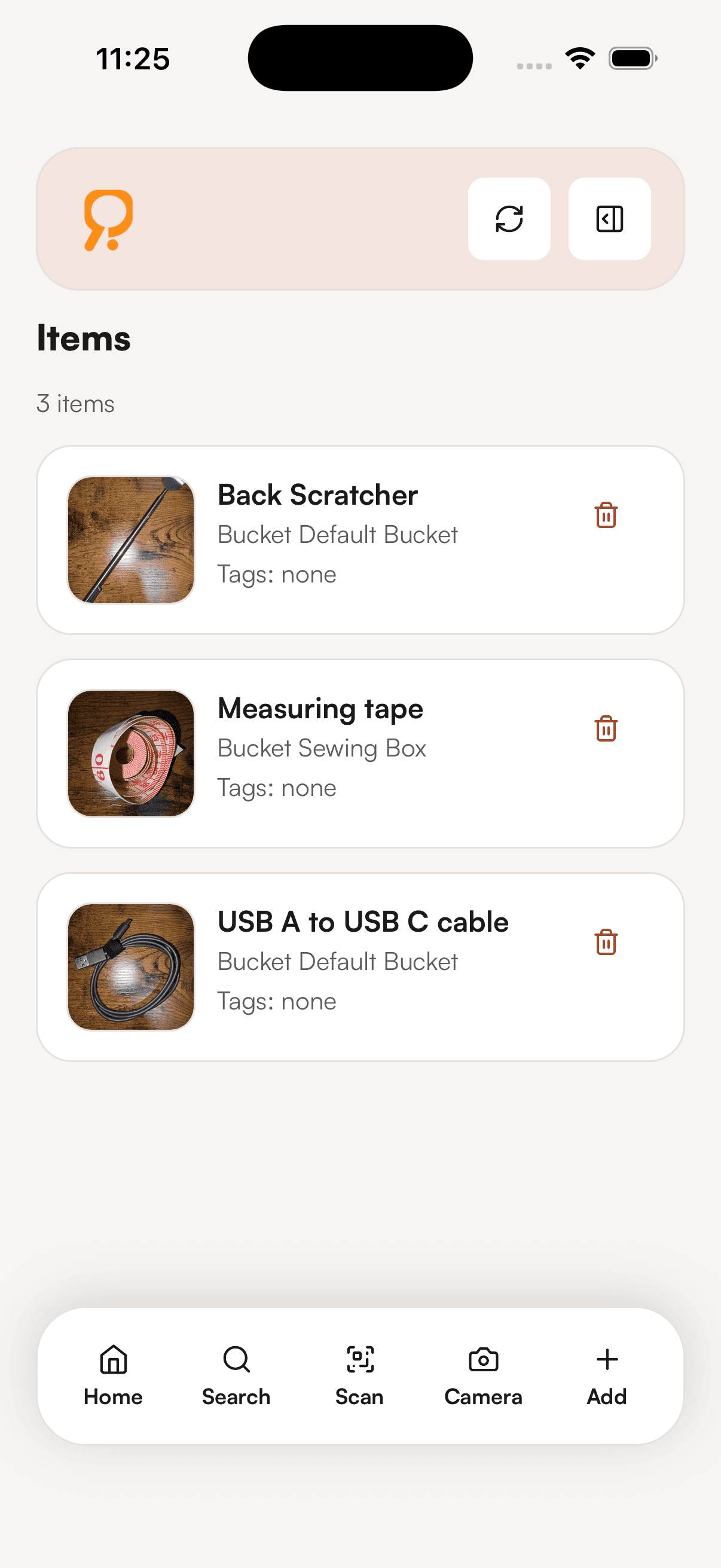 ASA iPhone items screen showing stored items like a back scratcher, measuring tape, and USB cable.